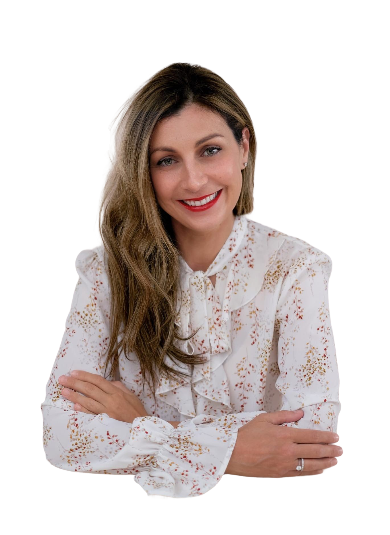 Woman in floral blouse with arms crossed
